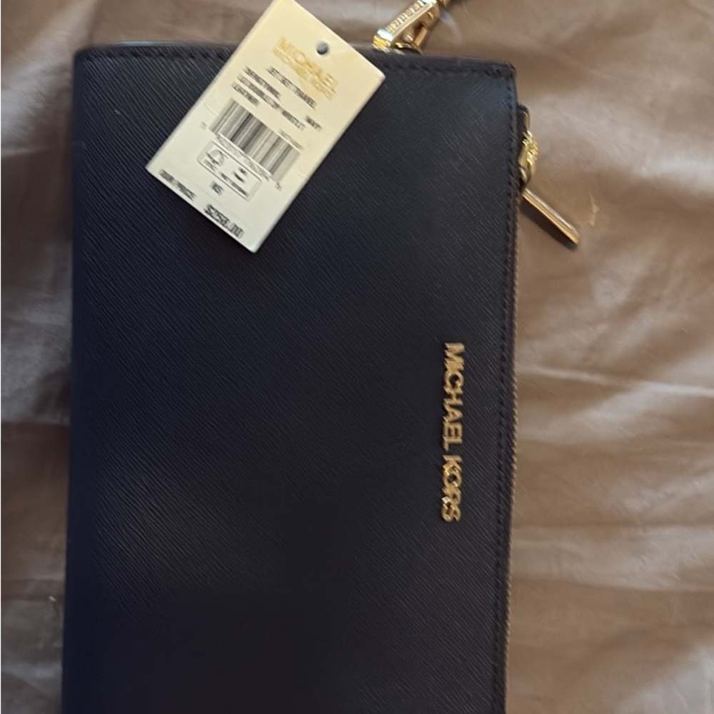 Michael Kors Navy Wristlet with Gold Details
